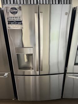 NEW OPEN BOX GE FRENCH STYLE REFRIGERATOR STAINLESS STEEL