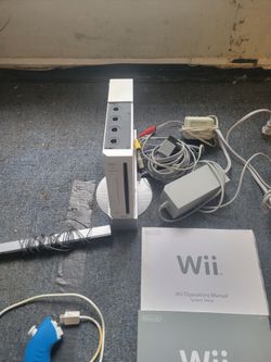 2 Wii consoles and gaming add on s