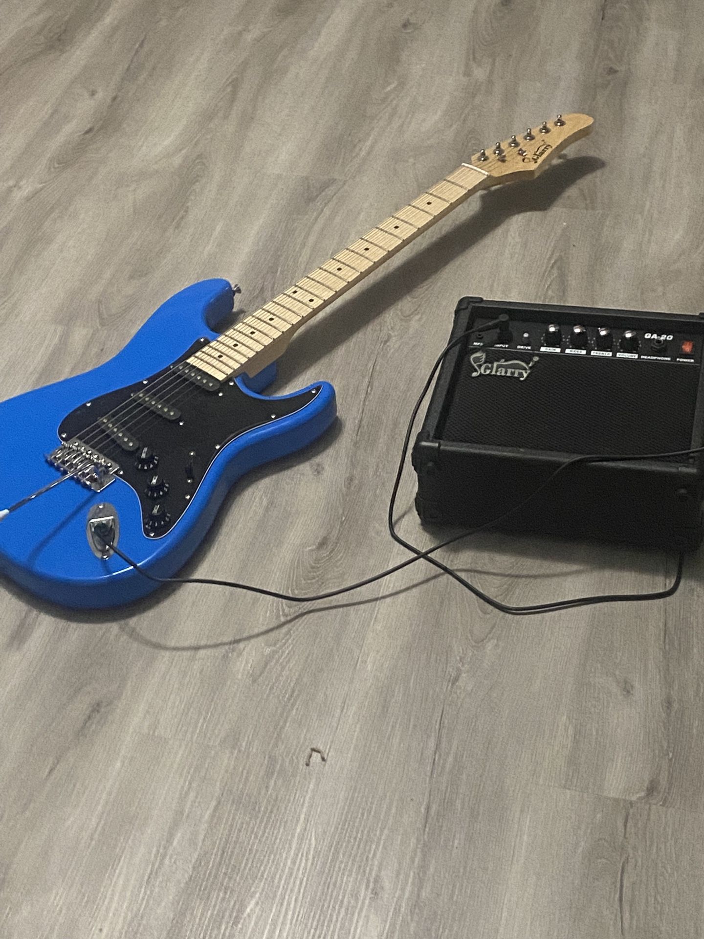 Electric guitar and amplifier