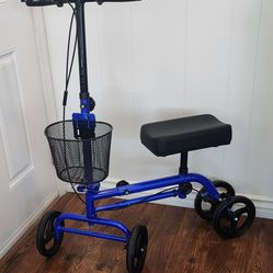 KNEE SCOOTER/WALKER.   BLUE FRAME, DUAL BRAKES, WIRE BASKET, WIDER FRONT/LARGER TIRES. EXCELLENT CONDITION!