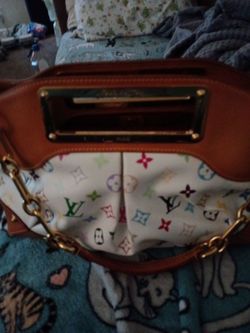 LUIS VUTTON MULTI COLOR PURSE BEAUTIFUL  INSIDE AND OUT!