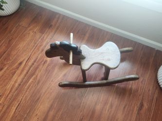 Brown solid wood 1950s rocking horse