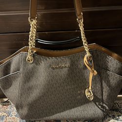 Brown Michael  Kors Hand Bag, Worn Only Once In Perfect Condition. Selling For $150.