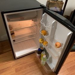 Fridge  19.5 Wide X 22 Deep X 33.5 Tall.