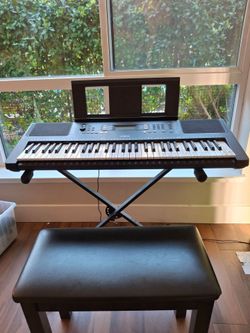 Yamaha 61-key Touch Sensitive Keyboard + stand + Seat