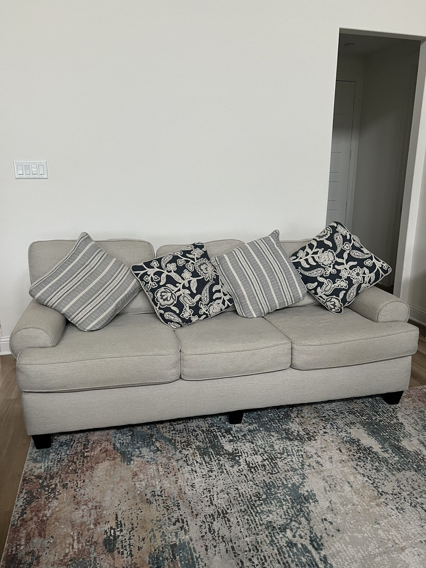 Sofa and Loveseat with Pillows —NEED GONE ASAP