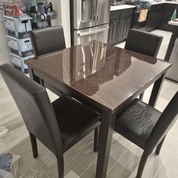 Table And 4 Chairs