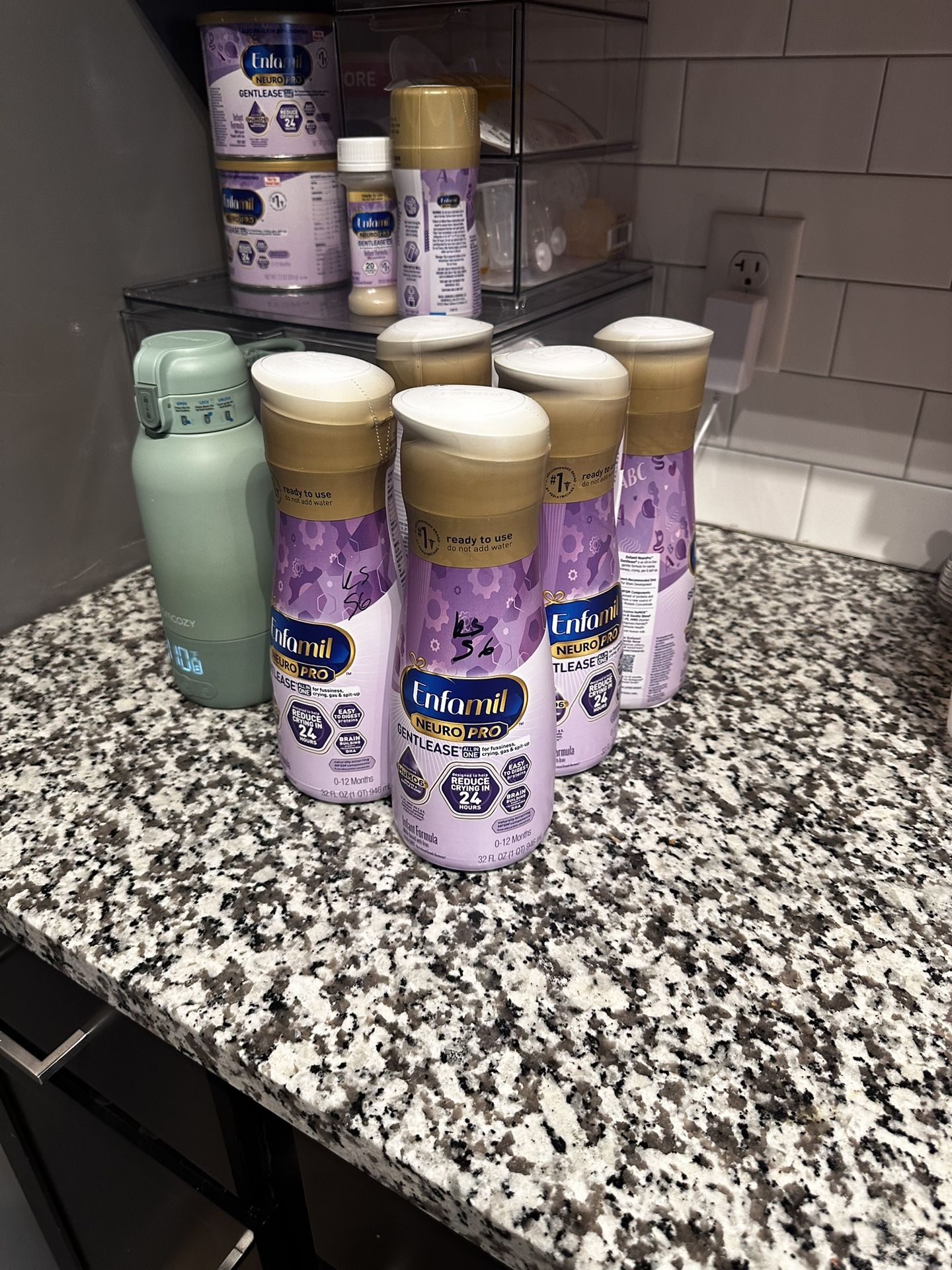 Five Enfamil Liquid Bottles