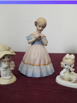 Precious moments figurines and ceramic teacup set