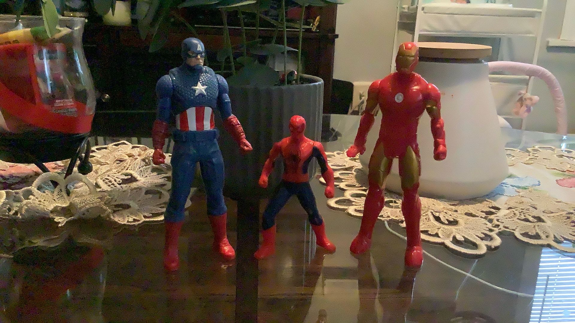 Three action figures of Marvel characters Iron Man, Captain America In Spider-Man