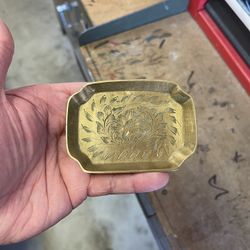 vintage brass tray or dish with an etched floral pattern. It could be used as an ashtray, soap dish, or a general catchall.  Material: Solid brass wit
