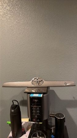 Toyota emblem and trim  (gray)