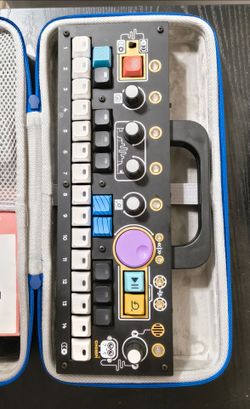 Synthesiser in carrying case