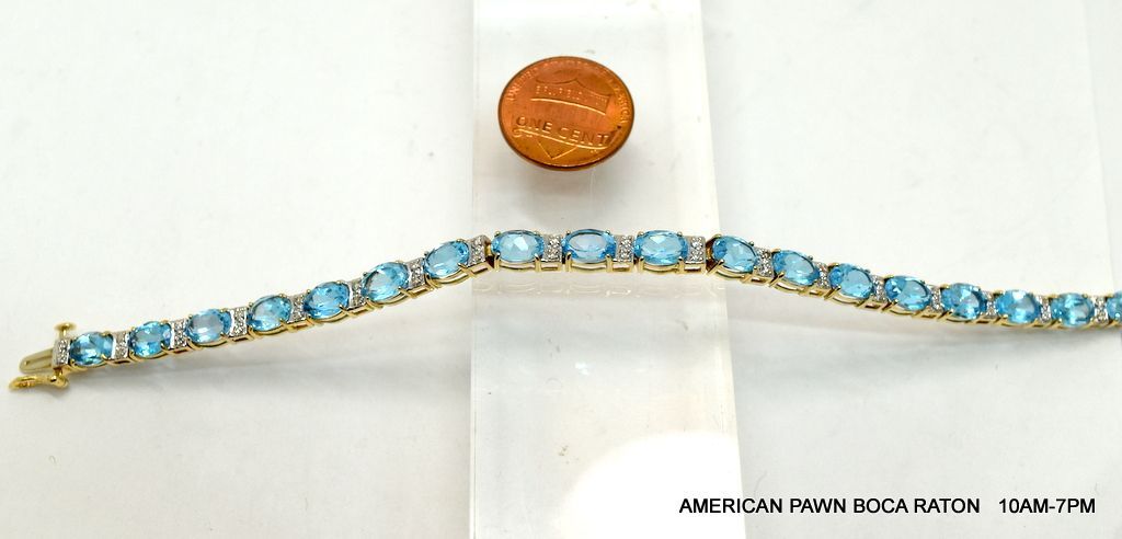 10K Yellow Gold Prong Set 7X5 MM Blue Topaz Link Tennis Bracelet Diamond Accent