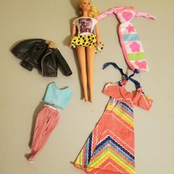 Vintage barbie dolls and clothes sets