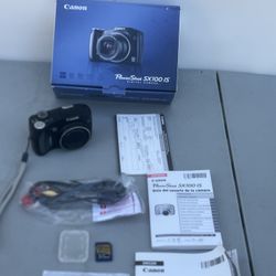Canon Power Shot SX100 IS 8MP 10X OPTICAL Zoom DIGITAL Camera With Accessories. Only what’s pictured in addition to a carrying case and USB not pictur