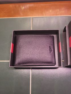 TUMI Nassau Double Billfold wallet in a Black leather finish