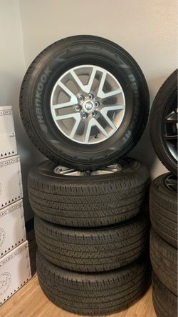 Brand new OEM original Nissan 16” wheels and tires NEW