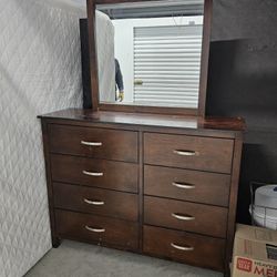the dresser that has a mirror to go with it I want 