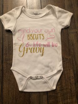 6-12 month’s onesie - new