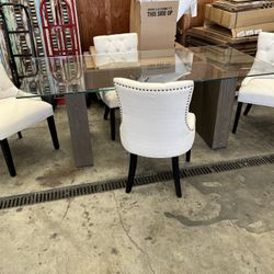 Elegant dining room table and four chair chairs