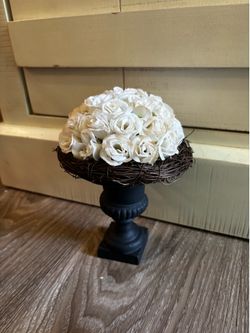 7” tall grouping of white baby roses on wood stand
