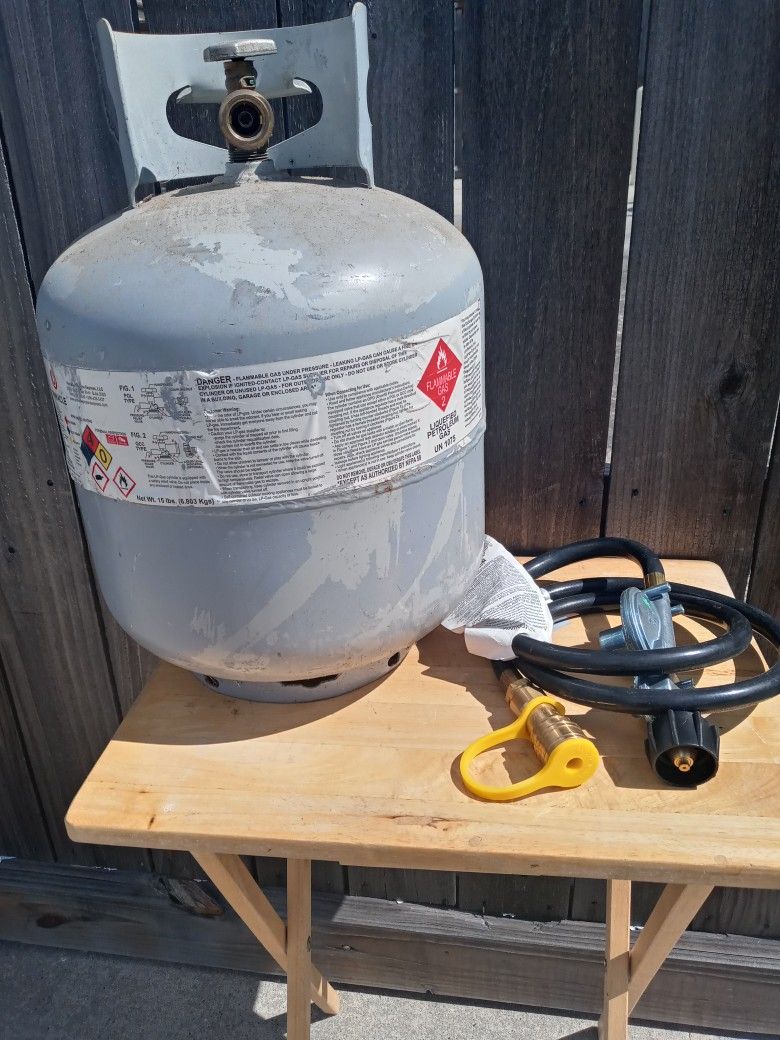 Full Tank Of Propane And Brand New Adaptor