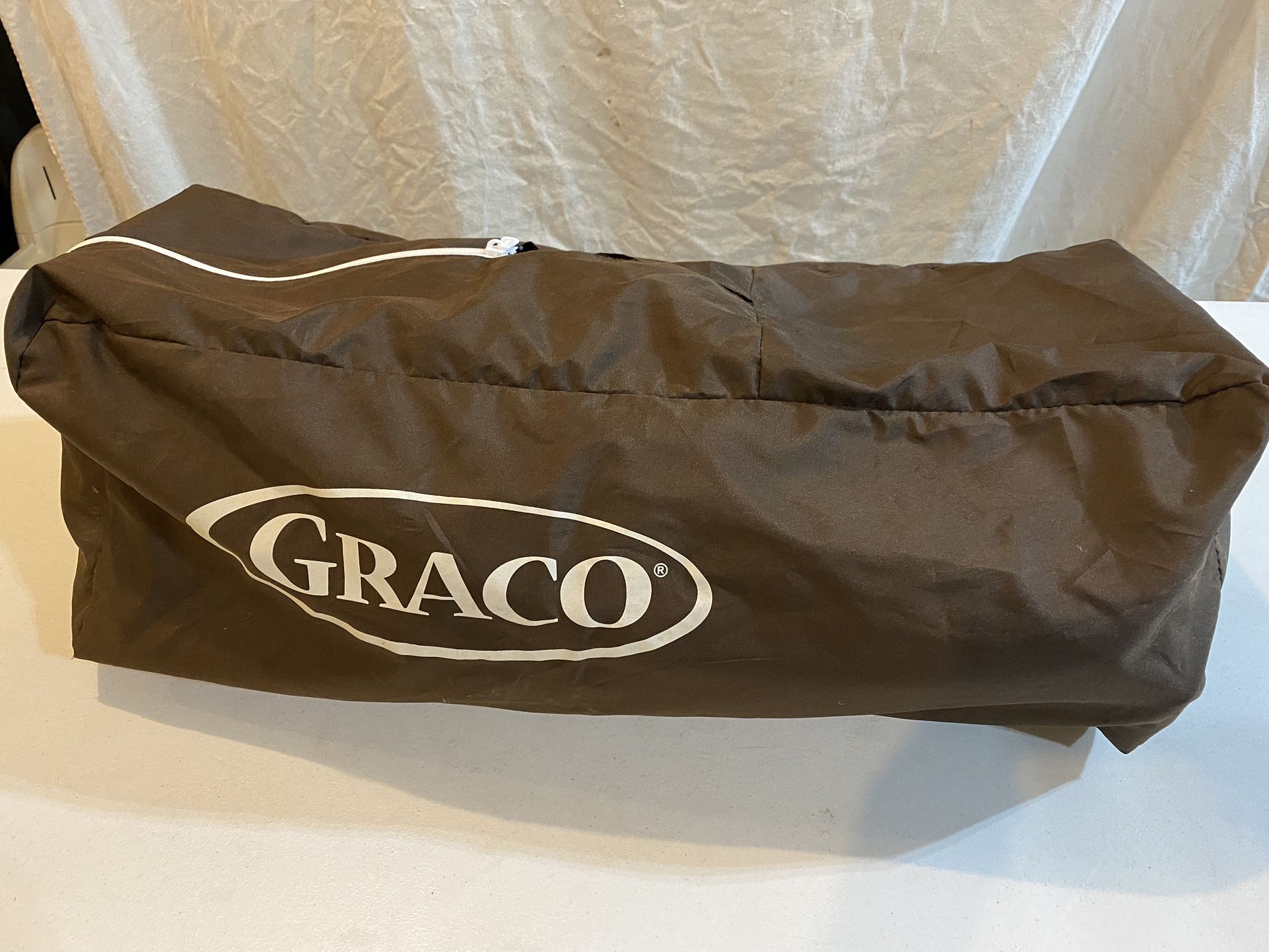 Graco Pack N Play (light teal)