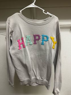 Size medium/large women's happy sweater