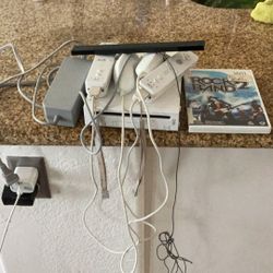 Nintendo Wii system to controller to non-check one game excellent condition works very good