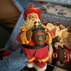 8 Collectible Santa Figurines 