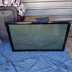 4 flat screen tv's and wall paintings