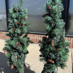 two matching holiday trees 