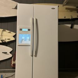 Excellent working whirlpool side-by-side refrigerator freezer