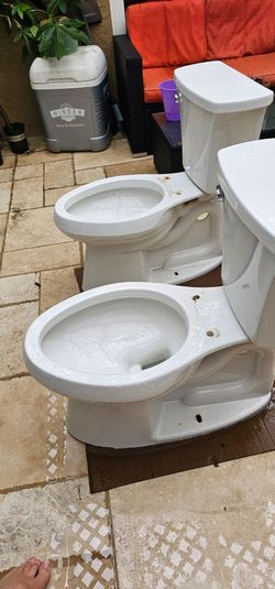 Two toilets for sale