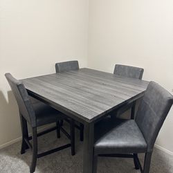 Counter Height Grey Dining Table and Faux Leather Chairs