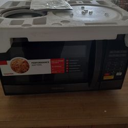BRAND NEW TOSHIBA MICROWAVE!!! 