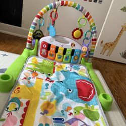 Fisher-Price Deluxe Kick & Play Piano Gym Infant Playmat with Electronic Learning Toy