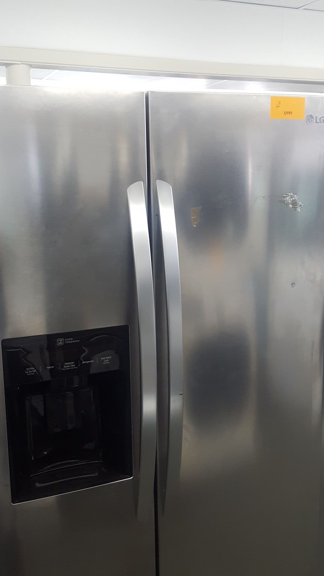 LG brand new scratch and dent side by side refrigerator stainless steel