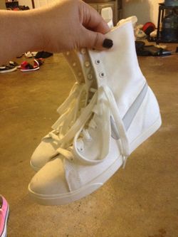 White Nike high tops