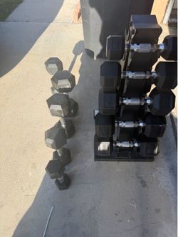 Very nice dumbbells 5-25lbs with weight rack.