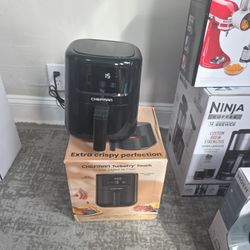 New fryer in box, never used.