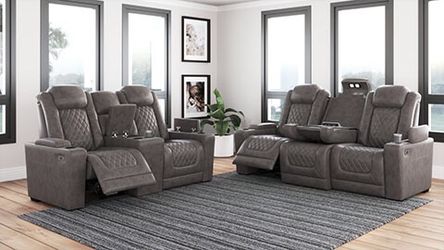 Power reclining sofa and love seat