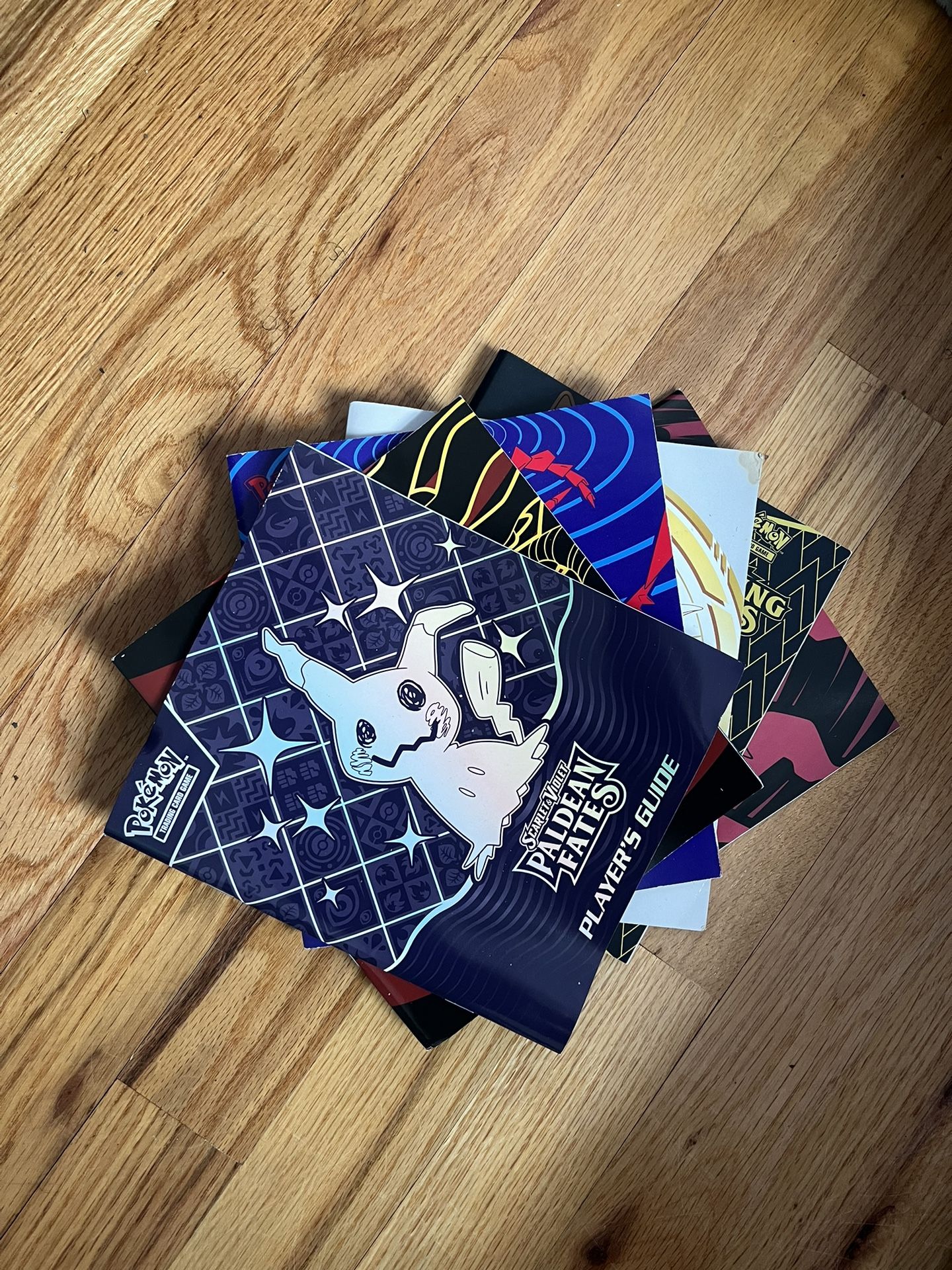 Various Pokémon ETB Player’s Guides