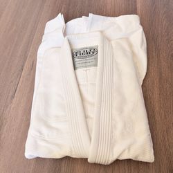 white Built2Fight Industries premium competition gi made of 100% cotton.