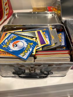 2 tin bins of Pokeman Cards