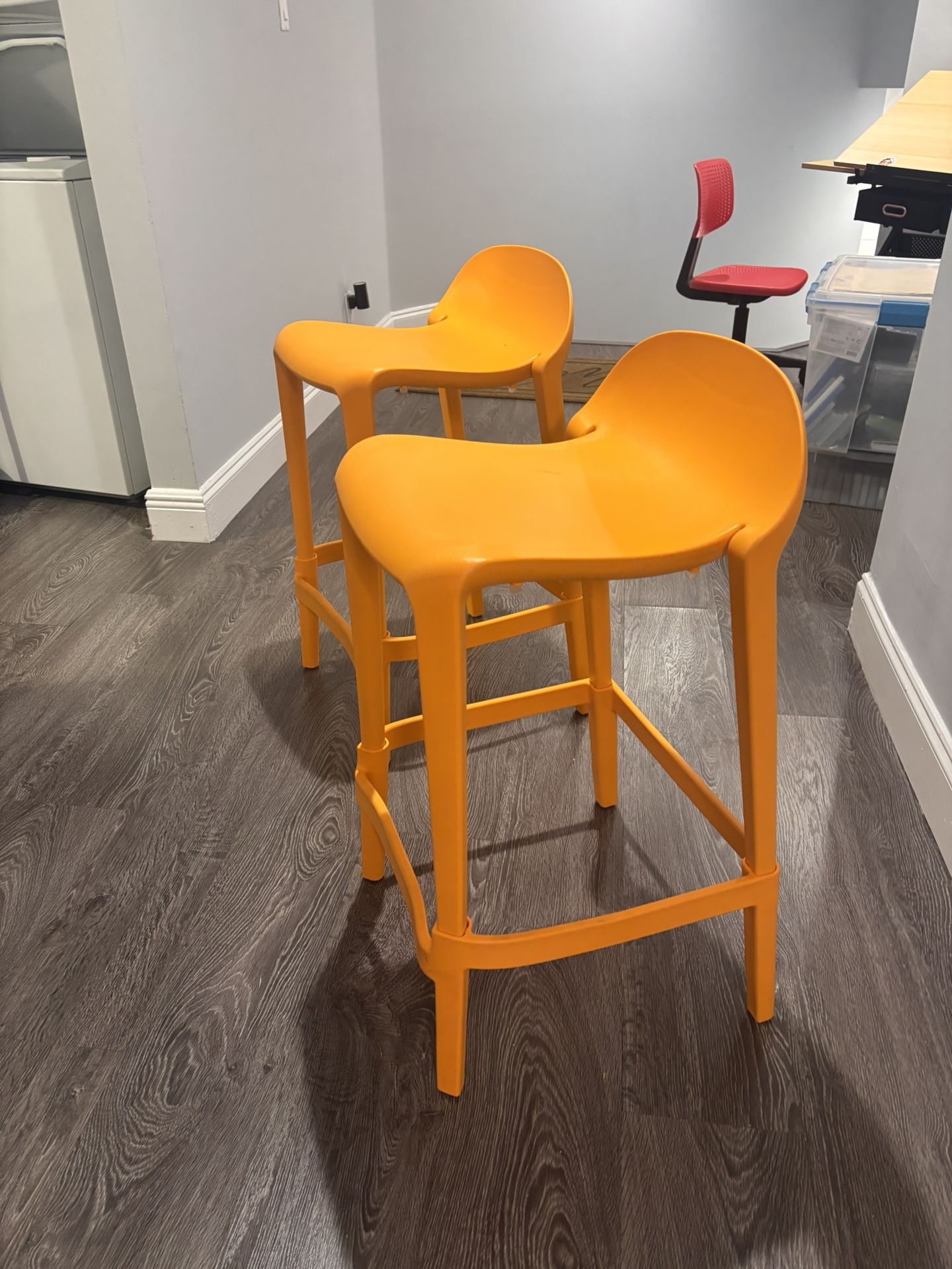 Two Orange bar Stools