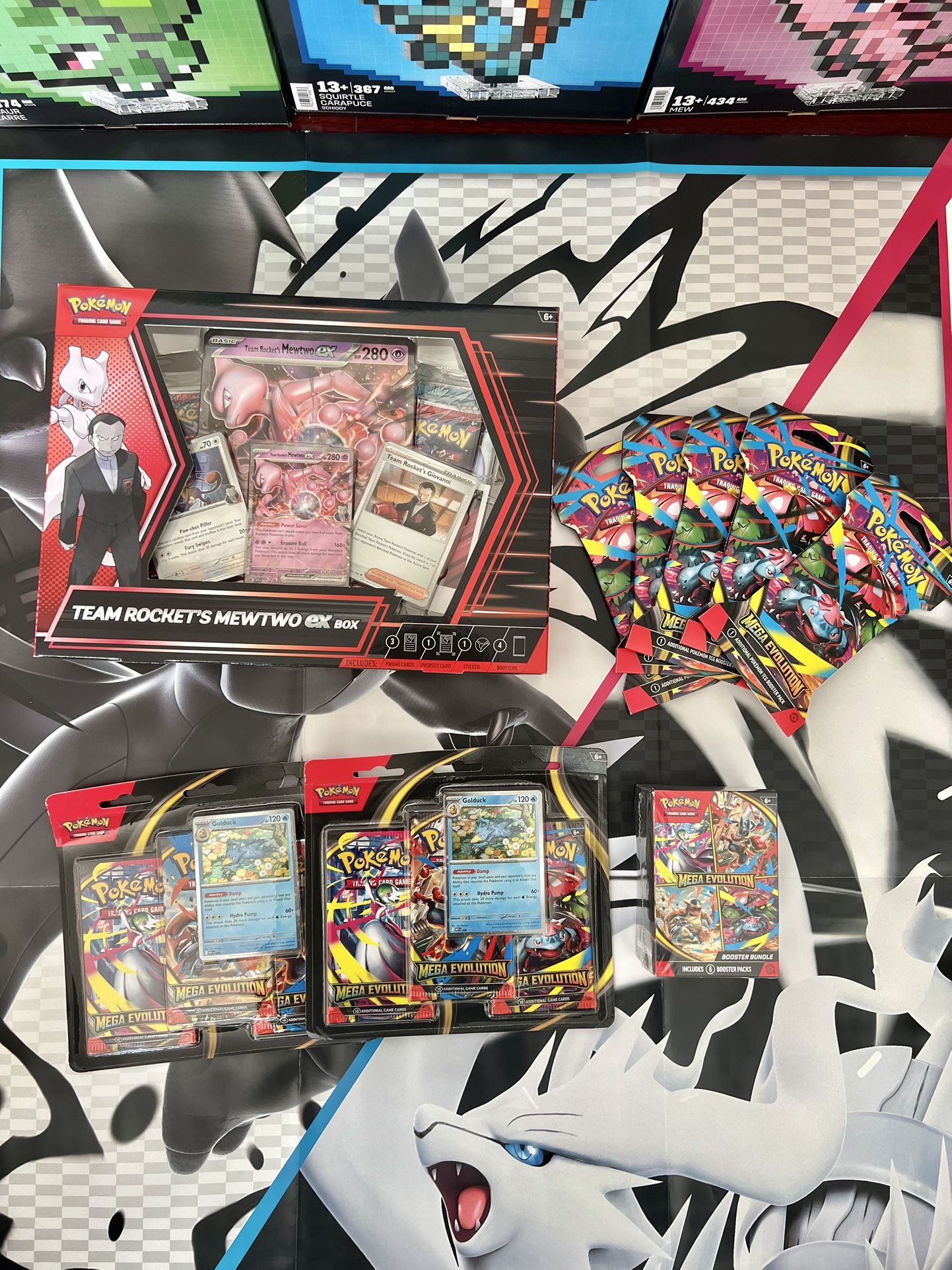 Mega Evolution(1 Booster Bundle, 5 sleeves, 2 blister packs) &1 Team Rocket Box (See description)