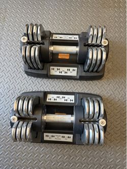 Pair of adjustable dumbbells (10-50 lbs each) - Great condition
