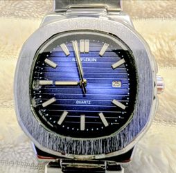 Light blue watch. Stainless steel. Very elegant